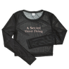 Black mesh crop top with long sleeves. Text reads "A Secret Third Thing"