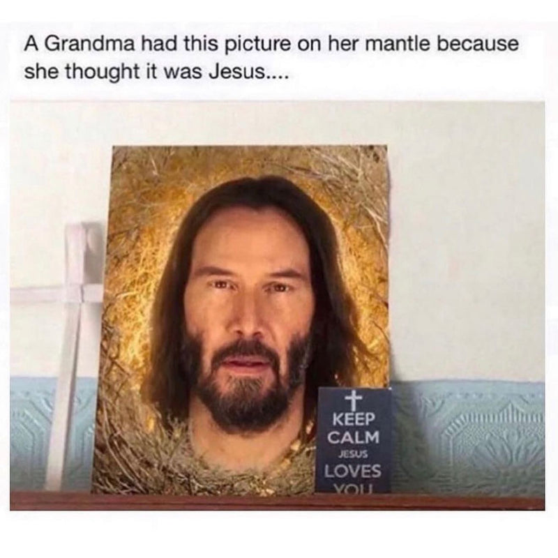 A Grandma had this picture on her mantle because she thought it was Jesus.... Photo of a framed portrait of long-haired, bearded Keanu Reeves beside a cross and a Keep Calm Jesus Loves You sign.